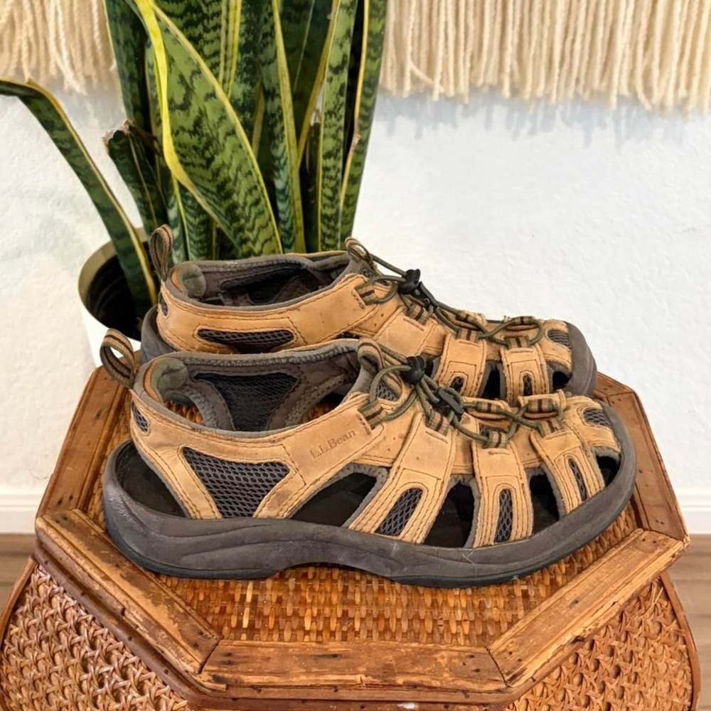 LL bean tan hiking sandals with black accents. Size: US 7.5